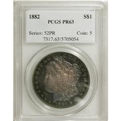 1882 S$1 PR63 PCGS. The plum-red fields and devices ar