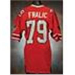 On the front left tail of the jersey is the "Russell" size 46 manufacturer's tag. Above this is the 