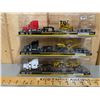 Image 1 : LOT OF 3 NORSCOT 1/87 SCALE PETERBILT HWY TRACTORS HAULING CONSTRUCTION EQUIP