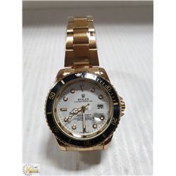 REPLICA ROLEX WITH GOLD TONE AND BLACK FACE