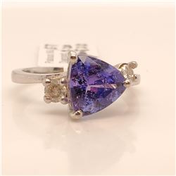 31) PLATINUM TANZANITE AND DIAMOND RING