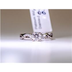 32) PLATINUM DIAMOND RING