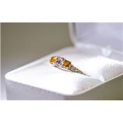 34) PLATINUM FANCY COLORED DIAMOND RING