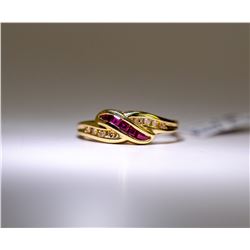35) 14 KARAT YELLOW GOLD RUBY AND DIAMOND RING