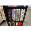 Image 3 : SHELF WITH DVDS AND BOOKS