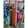 Image 1 : BLACK HAMPTON METAL STORAGE RACK WITH ASSORTED WEIGHT GEL-BAR URETHANE AEROBIC BARS