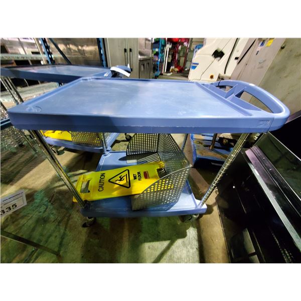 BLUE METRO 2 TIER MOBILE PRODUCT CART WITH WET FLOOR SIGN AND STYLIZED CASH-RESISTER GUARD