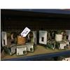 Image 2 : SHELF OF ASSORTED CERAMIC AND WICKER GEL GARDEN BURNERS