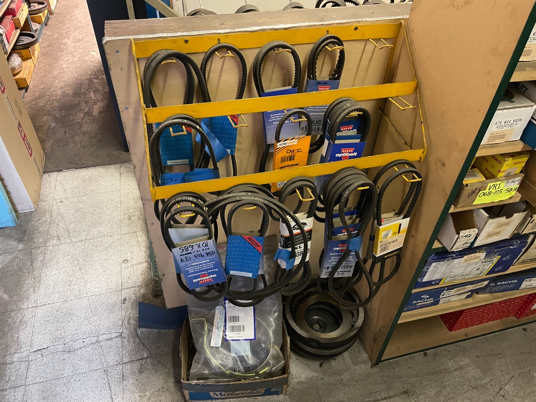 ASSORTED FAN BELTS AND FAN BELT HANGING RACK WITH CONTENTS ( LOCATED IN ...