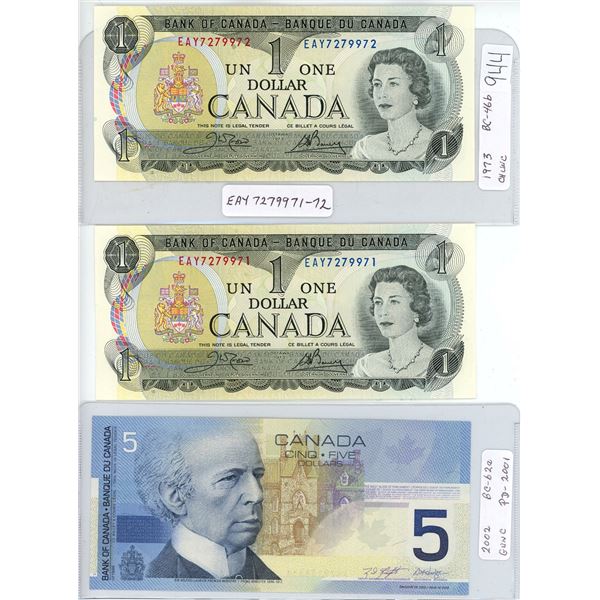 Two consecutive 1973 one dollar  bills, one 2002 five dollar bill printed in 2001
