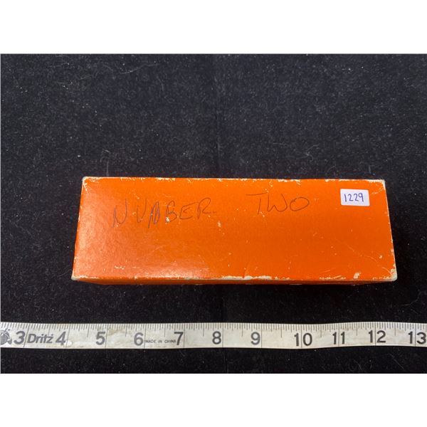 Orange Box Of Canadian Five Cent Coins In Yellow Envelopes