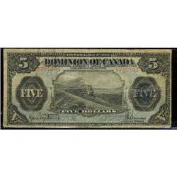 DC-21e  1912 $5 B797953 Hyndman-Saunders, seal/five.  VG-F.  A rare note!