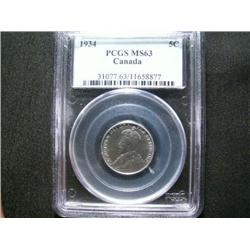 1934 5¢ ICCS MS63.  A strong strike example with full beads. Scarce!