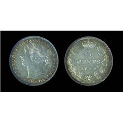 1858 20¢ PCGS MS63.  Strong strike with great toning around the rims. Brilliant and lustrous at cent