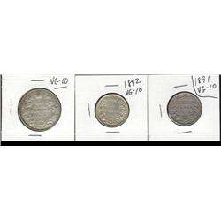 Lot of 3 coins. Twenty-five cents; 1891, 1892, Fifty cents; 1912.  All VG10.