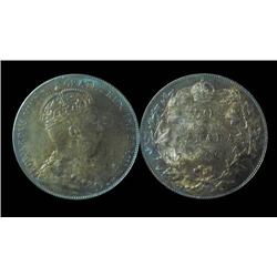 1906 50¢ ICCS MS64.  An absolute near Gem example.  It has the look of a 65.  Flashy toning with gem