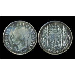 1949 Hoof  50¢  PCGS MS64.  Light tone over full underlying lustre.  Scarce!