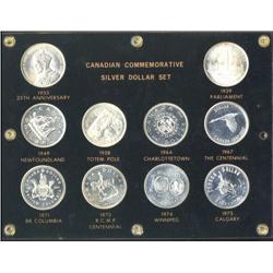 Lot of 10 commemorative silver dollars including 1935, 1939,1949,1950,1964,1967,1971,1973,1974,1975.