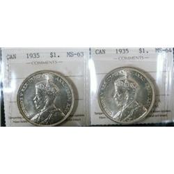 1935 $1 ICCS MS63 & MS64.  Lot of two coins both shite examples.
