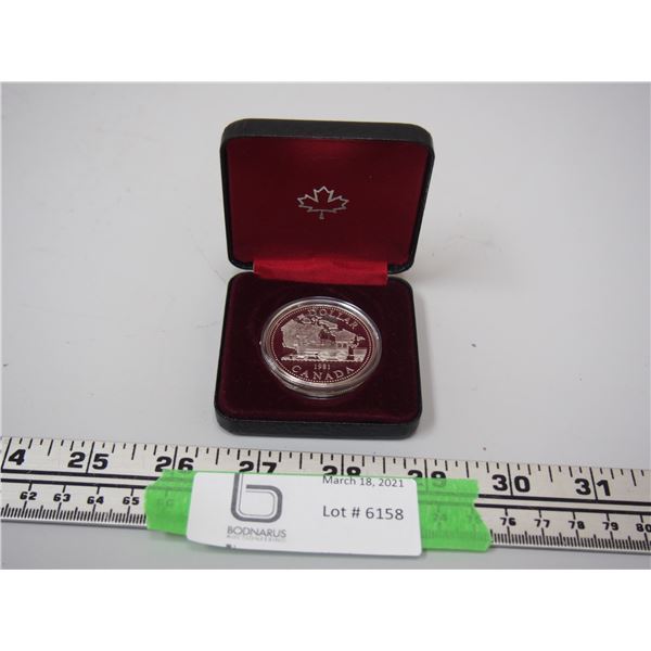 1981 CANADIAN DOLLAR IN CASE SILVER