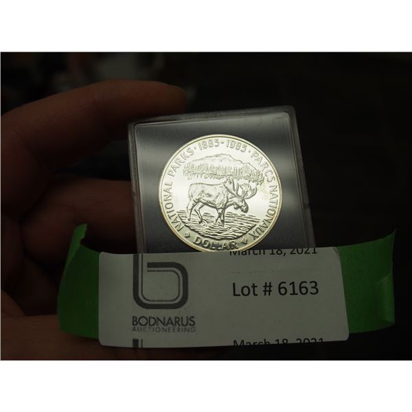1885-1985 NATIONAL PARKS CANADIAN SILVER DOLLAR IN PLASTIC CASE