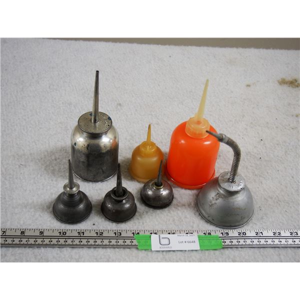7 Small Oil Cans (2 Plastic)