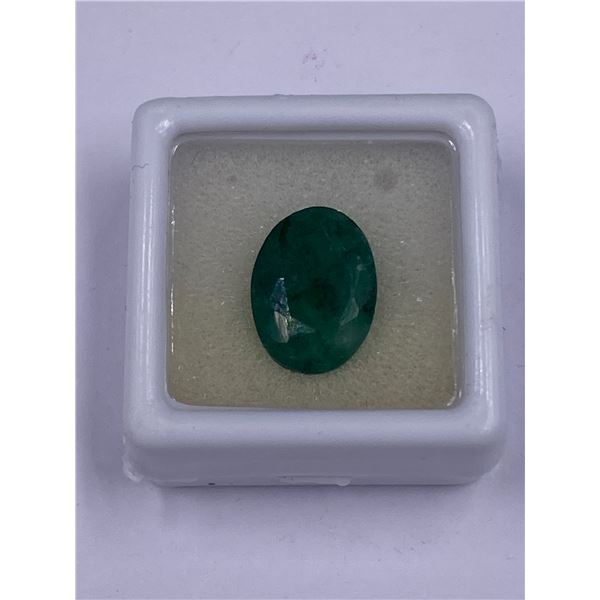 BIG NATURAL EMERALD 7.07CT 13.75 X 10.07 X 5.95MM, DARK GREEN, OVAL CUT, TRANSLUCENT, BRAZIL