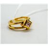 Image 1 : GOLD TONE RING WITH CUT AMETHYST CENTRE STONE
