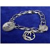 Image 1 : STERLING SILVER CHARM BRACELET WITH THREE CHARMS