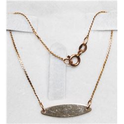 10K GOLD SERPENTINE LINK ID BRACELET 7"