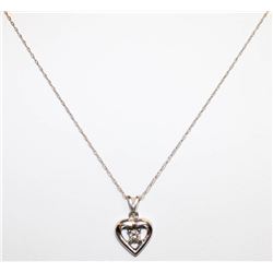 PLATINUM AND DIAMOND HEART PENDANT ON 16" CHAIN