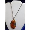 Image 1 : SILVER TONE NECKLACE WITH LARGE AMBER LIKE