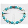 Image 1 : TURQUOISE AND BLUE LAVA STONE BEADED 6" BRACELET
