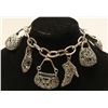 Image 1 : VINTAGE SILVER COLOR ORNATE SHOE AND PURSE CHARM 8" BRACELET