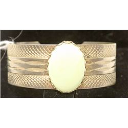 SILVER TONE BRACELET WITH GREEN STONE