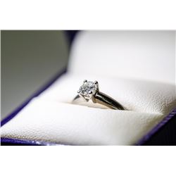 A PLATINUM DIAMOND SOLITAIRE RING BY BIRKS. SIZE 6