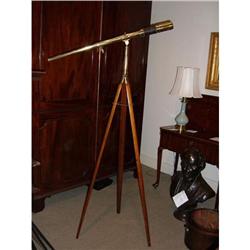 Telescope mounted on a surveyor's tripod #1515086