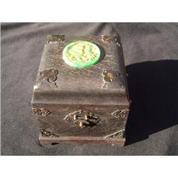 Antique wood container containing an ancient #1515237