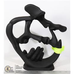 BLACK ART FIGURINE - MAN HOLDING