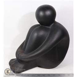 LARGE BLACK CERAMIC SEATED PERSON