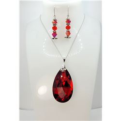 25)  LARGE TEAR DROP RED FACETTED TITANIUM
