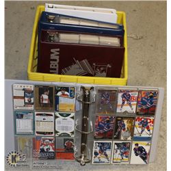 LOT OF 4 BINDERS OF HOCKEY CARDS.