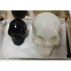 SET OF TWO CARVED STONE SKULLS - MEDIUM: