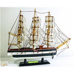 BLACK AND WHITE HULL SAILBOAT 14 1/2 HX 17 1/2 W