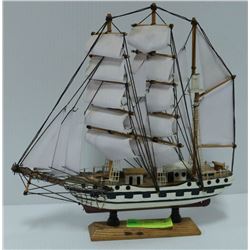 BLACK AND WHITE HULL SAILBOAT 13'H X 13' W