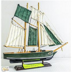 GREEN AND WHITE SAILED - SAILBOAT. 9'H X 10' W
