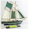 Image 1 : GREEN AND WHITE SAILED - SAILBOAT. 9'H X 10' W