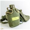 Image 1 : HEAVY DUTY CANTEEN WITH POUCH ON A BODY HARNESS