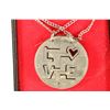 Image 1 : LOVE NECKLACE MADE OUT OF A 1974 KENNEDY HALF