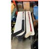 Image 1 : 3 HOCKEY STICKS - ONE IS GOALIE